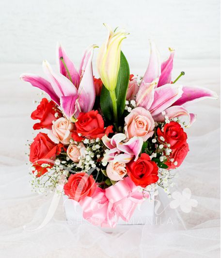 Charming Pink Flowers in a Round Box